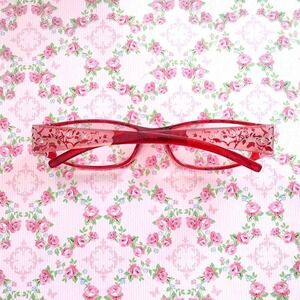 Chic Red Eyeglasses with Intricate Floral Design and Rhinestone Accents